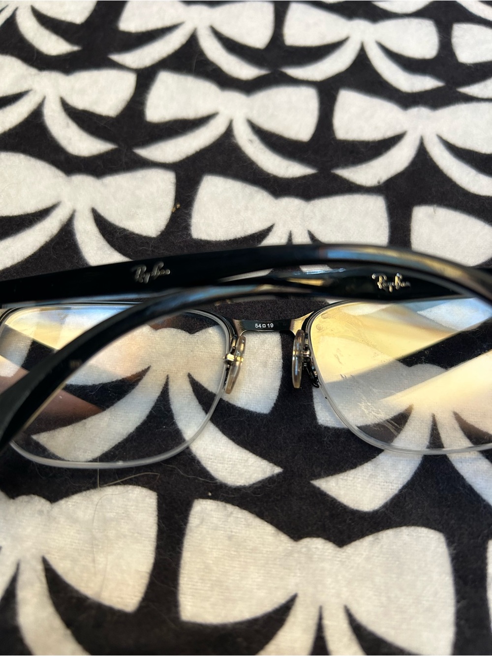 Ray-Ban Men's Black Semi-Rimless Glasses with Silver Accents. Frames